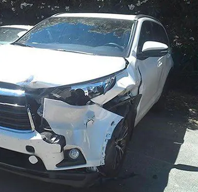 White SUV before the repair